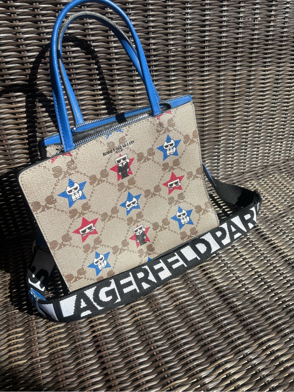 Karl Lagerfeld Beige Monogram Tote with Blue Handles and Red & Blue Star Accents